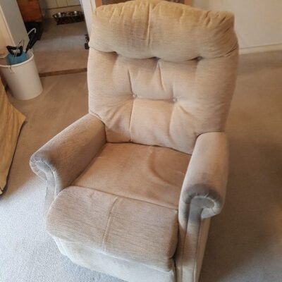 A recliner chair in a living room.